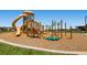 Modern playground with slides, climbing structures, and monkey bars at 14461 Mosaic Ave, Parker, CO 80134