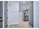 Inviting foyer with sleek hardwood floors leads to a modern, open-concept living space at 1821 N Grove St, Denver, CO 80204