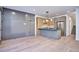 Spacious open-concept living space featuring a modern kitchen and sleek cabinetry at 1821 N Grove St, Denver, CO 80204