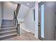 Contemporary staircase with metal railings and natural light creates a modern, open feel at 1821 N Grove St, Denver, CO 80204
