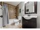 Clean bathroom with a tub, toilet and vanity at 15967 Butterwort Cir, Parker, CO 80134