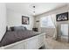 Bright bedroom with a queen bed and window coverings at 15967 Butterwort Cir, Parker, CO 80134