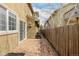 Exterior view of the home featuring a wood deck and fence at 1653 S Logan St, Denver, CO 80210