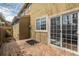 Exterior view of the home with a deck and sliding glass doors at 1653 S Logan St, Denver, CO 80210
