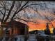 View of barns at sunset on the property at 200 Bothun Rd, Berthoud, CO 80513