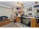 Basement space with wrap station, guitar, and storage at 200 Bothun Rd, Berthoud, CO 80513