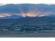 Scenic mountain views with a radiant sunset, showcasing the natural beauty of the surrounding landscape at 200 Bothun Rd, Berthoud, CO 80513