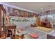 Living room boasting decoratively adorned walls, wood floors, and ample natural light at 18090 E 47Th Dr, Denver, CO 80249