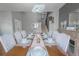 Formal dining room boasts a modern chandelier and staircase in view at 1586 S Goldbug Cir, Aurora, CO 80018