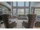 Bright living room featuring a cozy fireplace, and comfortable seating for conversation at 1586 S Goldbug Cir, Aurora, CO 80018
