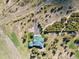 Aerial view of a charming home on a spacious, wooded lot in a quiet neighborhood at 3557 Palmer Ridge Dr, Parker, CO 80134