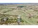 Expansive aerial view of a home and property surrounded by green space at 3557 Palmer Ridge Dr, Parker, CO 80134