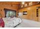 Primary bedroom features a balcony, built in storage, a king bed and views of the outdoors at 3557 Palmer Ridge Dr, Parker, CO 80134