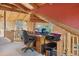 Office area featuring desk, computer, and wood beams at 3557 Palmer Ridge Dr, Parker, CO 80134