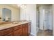 Bathroom featuring a granite countertop vanity and a tiled shower at 762 Tailings Dr, Monument, CO 80132