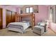Bright bedroom with a bunk bed and comfortable seating area at 5034 E Otero Cir, Centennial, CO 80122