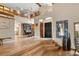 Spacious foyer featuring high ceilings, wood floors, and stairway at 5034 E Otero Cir, Centennial, CO 80122