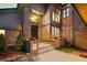 Charming front entrance with brick accents and inviting stairway at 5034 E Otero Cir, Centennial, CO 80122