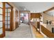 Hallway with doors leading to bedrooms, with natural light and a view of the stairs at 5034 E Otero Cir, Centennial, CO 80122