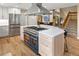 Contemporary kitchen island with cooktop, oven, and plenty of storage space at 5034 E Otero Cir, Centennial, CO 80122
