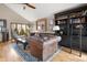 Inviting living room showcasing a leather sofa, bookshelves, and natural light at 5034 E Otero Cir, Centennial, CO 80122