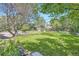 Lush green backyard with trees and foliage at 4490 Balsam St, Wheat Ridge, CO 80033