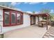 Backyard featuring a patio, pergola, and mature trees at 6235 W Floyd Ave, Denver, CO 80227