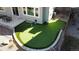 Backyard putting green for entertainment. Ideal for golf enthusiasts at 6508 Moss Cir, Arvada, CO 80007