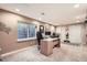 Home office in the basement with lots of natural light and double closet at 6508 Moss Cir, Arvada, CO 80007