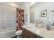Cozy bathroom with vanity, decorative mirror, and bathtub offers a relaxing space at 7202 Canyonpoint Rd, Castle Pines, CO 80108