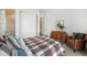 Comfortable bedroom with closet and easy access to ensuite bathroom boasts ample space and natural light at 7202 Canyonpoint Rd, Castle Pines, CO 80108