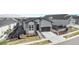 Attractive single-Gathering home with a manicured front yard, stone accents, and a paved driveway at 7202 Canyonpoint Rd, Castle Pines, CO 80108