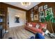 Stylish living room with modern lighting, unique artwork, and comfortable seating arrangements at 7202 Canyonpoint Rd, Castle Pines, CO 80108