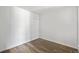 Empty bedroom with hardwood floors and neutral-colored walls at 7820 W 87Th Dr # K, Arvada, CO 80005