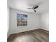 Spacious bedroom with ceiling fan and hardwood floors at 7820 W 87Th Dr # K, Arvada, CO 80005