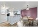 Eat-in kitchen with a dining table and four chairs at 7820 W 87Th Dr # K, Arvada, CO 80005
