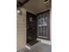 Unit entryway with security door and window at 7820 W 87Th Dr # K, Arvada, CO 80005