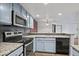 Kitchen features granite countertops and stainless steel appliances at 7820 W 87Th Dr # K, Arvada, CO 80005