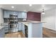 Updated kitchen with granite countertops and stainless steel appliances at 7820 W 87Th Dr # K, Arvada, CO 80005
