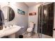 Bathroom featuring a shower and a pedestal sink at 3902 Eagle Tail Ln, Castle Rock, CO 80104