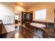 Spacious bathroom with a soaking tub and separate glass shower, tiled in warm neutral colors at 3902 Eagle Tail Ln, Castle Rock, CO 80104