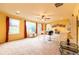 Bonus room featuring natural light, neutral carpet and ceiling fan at 3902 Eagle Tail Ln, Castle Rock, CO 80104