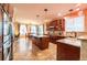 Spacious open-concept kitchen with a large island, stainless appliances, and ample natural light at 3902 Eagle Tail Ln, Castle Rock, CO 80104