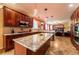 Modern kitchen with granite countertops, stainless steel appliances, and a spacious island for cooking at 3902 Eagle Tail Ln, Castle Rock, CO 80104