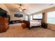 Large main bedroom with vaulted ceilings and natural light at 3902 Eagle Tail Ln, Castle Rock, CO 80104
