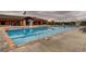 Enjoy this community pool with a blue umbrella and plenty of space for swimming laps at 3902 Eagle Tail Ln, Castle Rock, CO 80104