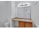 Bright bathroom with a sink, large mirror, and neutral finishes for a clean, modern look at 10715 Twenty Mile Rd # 203, Parker, CO 80134