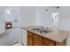 Kitchen with a view of the stainless steel sink and living area at 10715 Twenty Mile Rd # 203, Parker, CO 80134