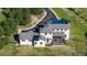 Aerial view of the home's backyard including a deck, fenced-in dog run, and luxurious outdoor space at 230 S Big Meadow Trl, Franktown, CO 80116