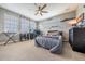 Bedroom filled with natural light and featuring decor and carpet at 230 S Big Meadow Trl, Franktown, CO 80116